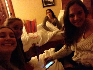 Jodi, Ali, Sydney, and Phoebe (left to right) all reunited on the Marriott hotel beds!